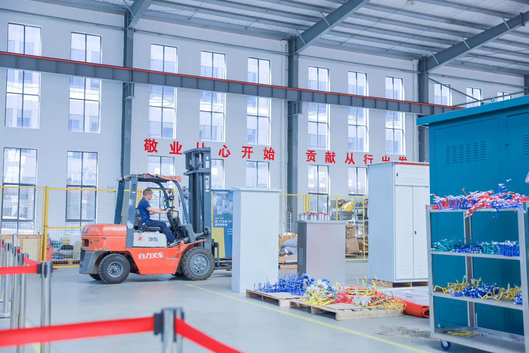 Factory logistics and cabinet movement inside the Minglang workshop
